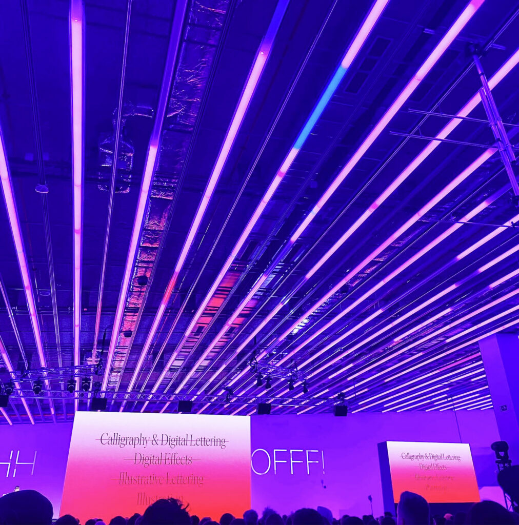 Photo of futuristic, purple-lit ceiling at the OFFF stage.